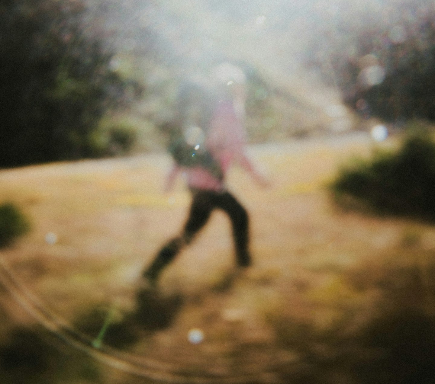 A lady trekking is depicted blurred.
